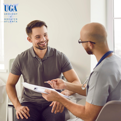 A man feeling good as his concerns are addressed during a doctor cosultation following a urinary catheter placement in Atlanta, Georgia.